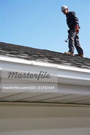 Man Working on Roof