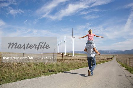Young Girl on Father's Shoulders