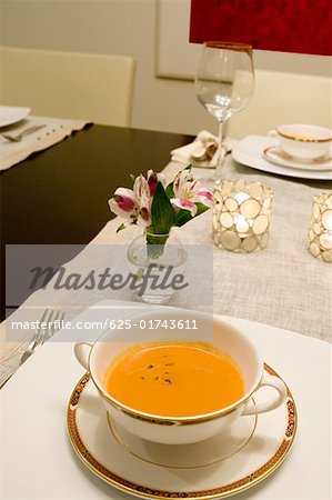 High angle view of soup in a bowl on a dining table