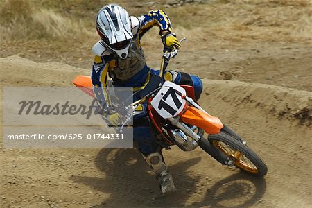 High angle view of a motocross rider riding a motorcycle