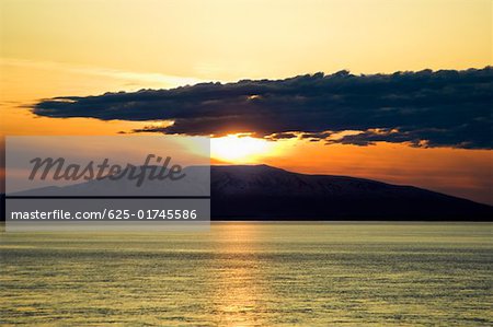 Sunset over an island, Fire Island, Alaska, USA