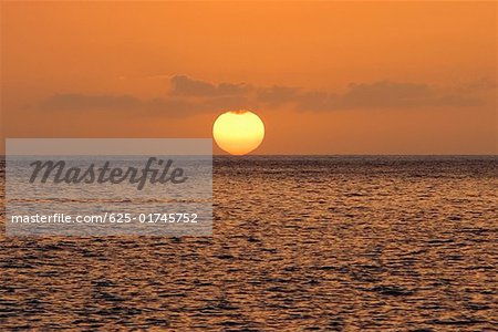 Sun over the sea, Pakini Nui Wind Project, South Point, Big Island, Hawaii Islands, USA