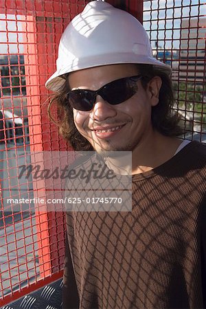 Close-up of a male construction worker smiling