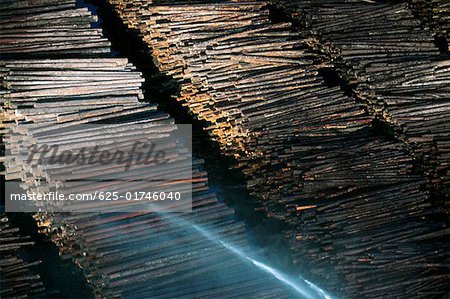 Watering logs to reduce heat buildup, sawmill, Idaho