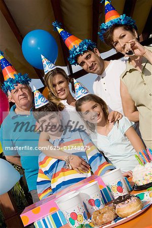 Portrait of a family celebrating a birthday party