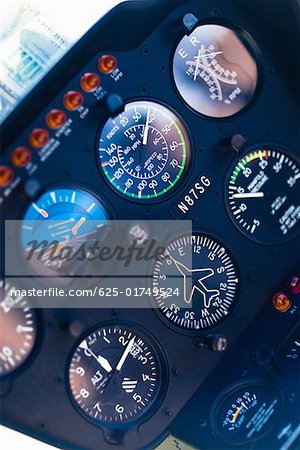 Close-up of dial gauges of an airplane