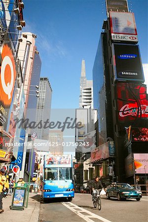 Bus on a road, Times Square, Manhattan, New York City, New York State, USA