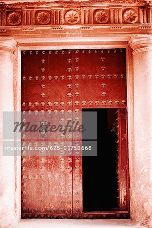 Red door of a house, Toledo, Spain