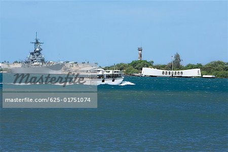 Military ship and a memorial building in the sea, USS Arizona Memorial, Pearl Harbor, Honolulu, Oahu, Hawaii Islands, USA