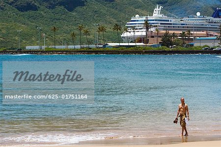 Tourists on the beach, Nawiliwili Beach Park, Kauai, Hawaii Islands USA