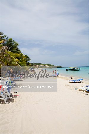 Touristes sur la plage, Honduras