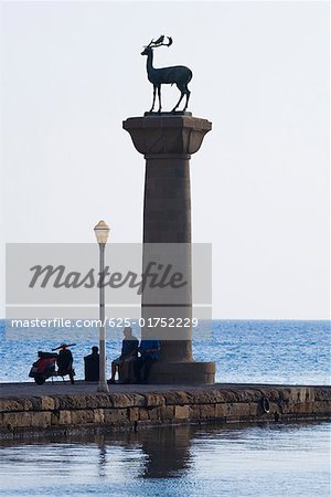 Monuments in the sea, Mandraki Harbor, Rhodes, Dodecanese Islands, Greece