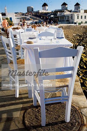 Tables and chairs in a restaurant Mykonos, Cyclades Islands, Greece