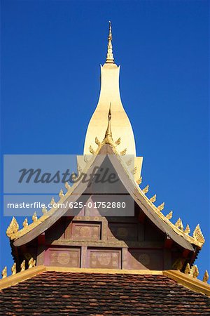 Low angle view of a temple, Buddhist temple, That Luang, Vientiane, Laos