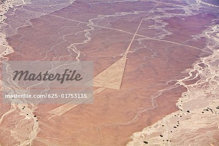 Aerial view of nazca lines representing a triangle in a desert, Nazca, Peru