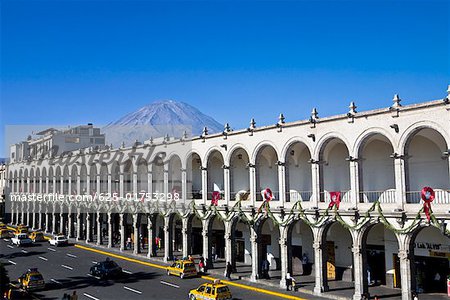 High angle view of cars moving on a road in front of a palace, Plaza-de-Armas, Arequipa, Peru