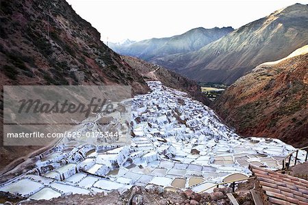 Terraced salt ponds on a mountainside, Salinas De Maras, Cuzco, Peru