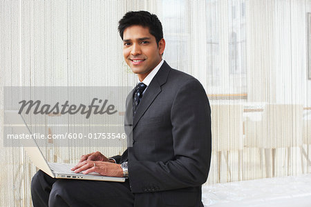 Businessman with Laptop Computer