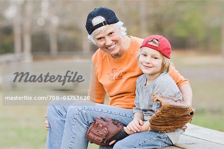 Woman and Grandson with Baseball Gloves