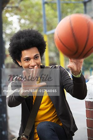 Portrait of Teenaged Boy With Basketball
