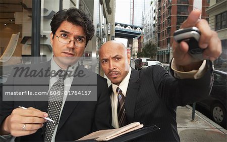 Businessmen on Sidewalk, New York City, New York, USA
