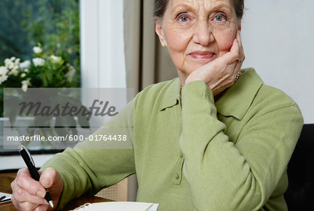 Portrait of Woman Writing in Journal