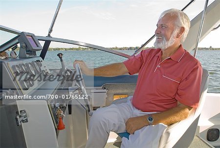 Man Driving Motor Boat