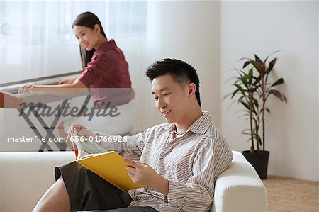 Couple relaxing at home