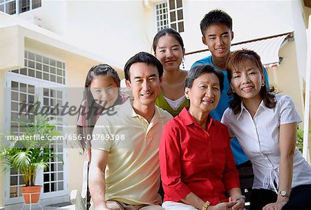 Three generation family, looking at camera, portrait