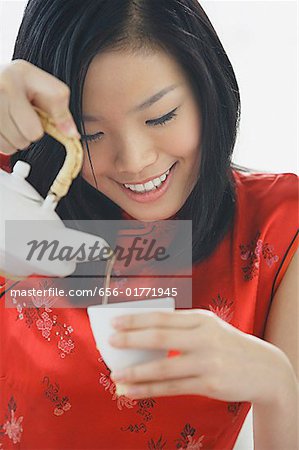 Woman pouring tea