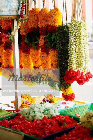 Brightly coloured flower garlands