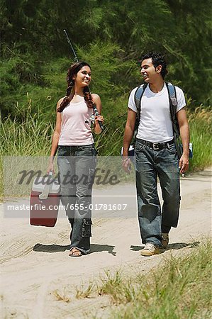 Young couple hiking in the wilderness