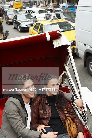 Couple in Horse-Drawn Carriage, New York City, New York, USA