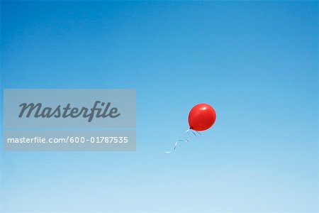 Red Balloon in Sky