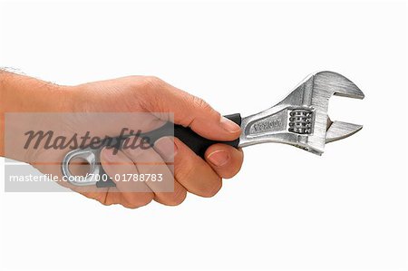 Hand Holding Adjustable Wrench