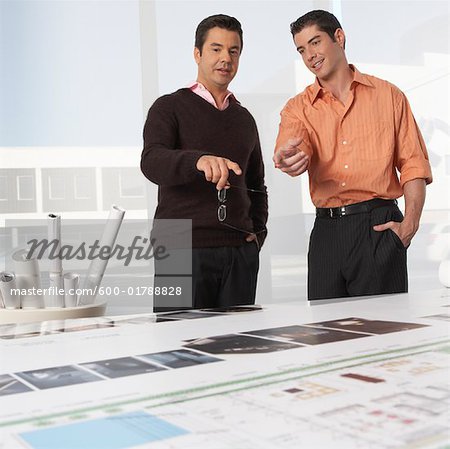 Architects Looking over Blueprint