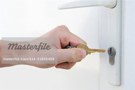 Door and person with key