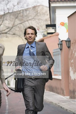 Businessman running