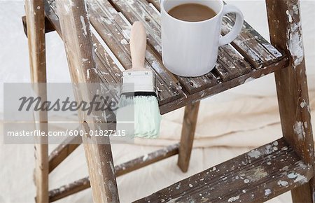 Paint Brush and Coffee Cup on Ladder