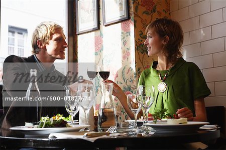 Couple Toasting with Wine in Restaurant