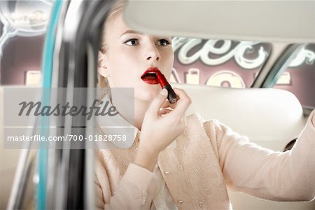 Woman in 1957 Dodge Regent, Applying Lipstick