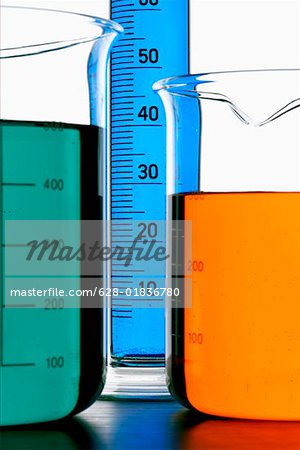 Beakers and text tube with several colored liquids