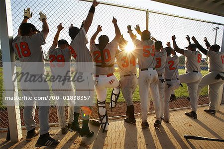 Baseball Players Cheering in Dugout