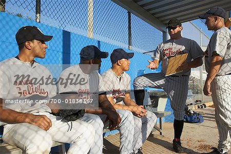 Coach Talking to Baseball Players