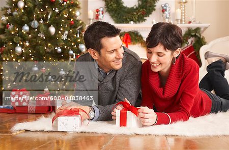Couple Opening Christmas Presents