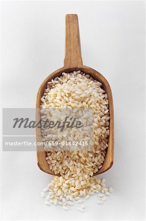 Arborio Rice in a Wooden Scoop