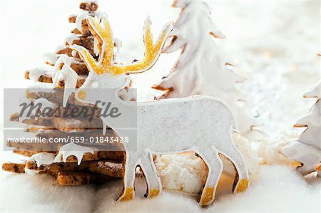 Chocolate stag biscuit in winter forest