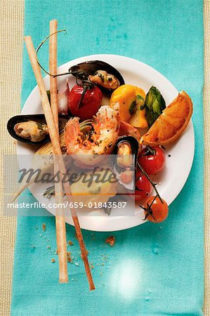 Plate of Mediterranean appetisers with grissini