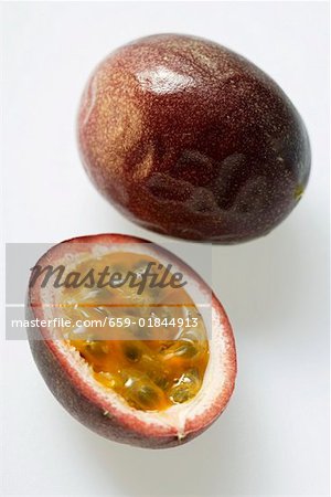 Whole and half passion fruit (Purple granadilla)