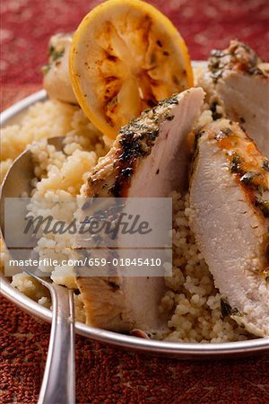 Spicy chicken breast on couscous